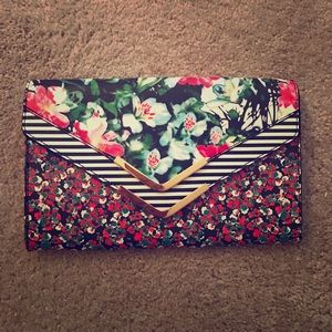 Aldo Multi colored clutch with gold chain strap