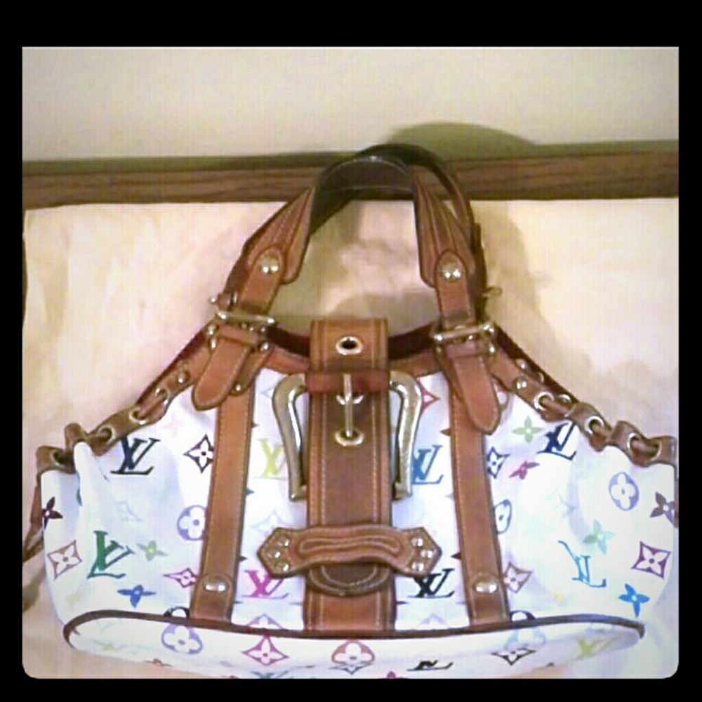 Authentic Louis Vuitton Theda bag