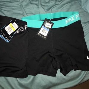 TWO pairs of Nike Pros!