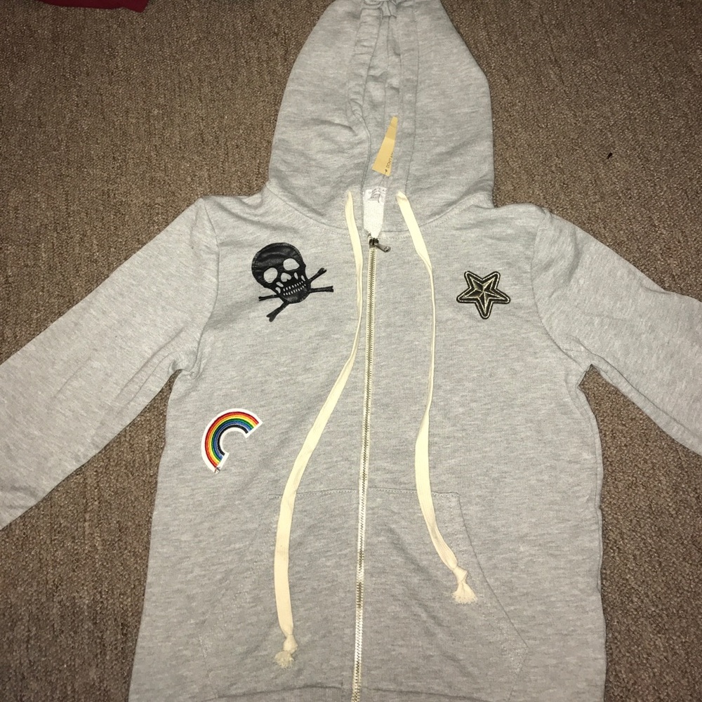 Cotton and polyester sweater with patches