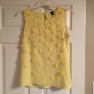 Yellow tank with flower appliqué