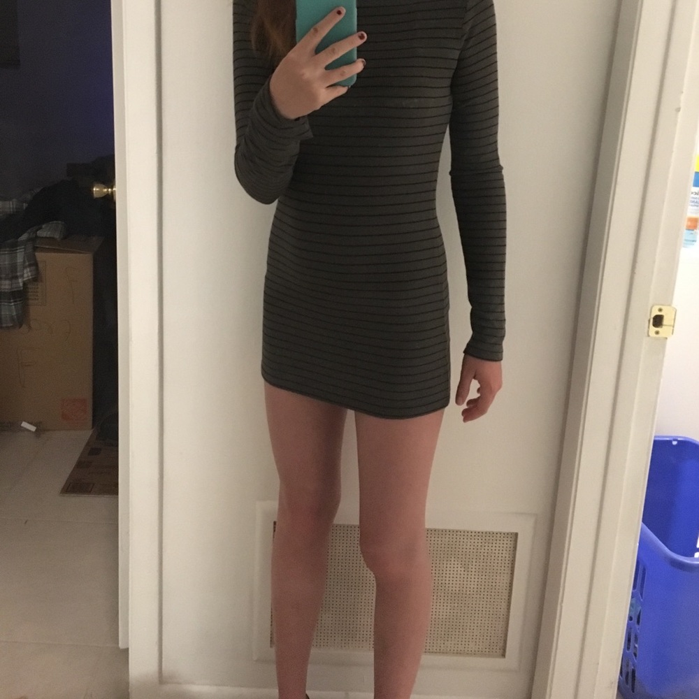 Olive and black striped high neck dress.