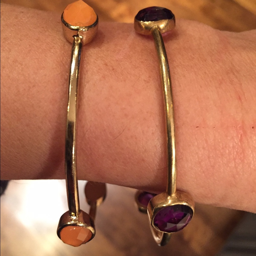 Two bangles with oval stones