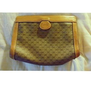 Vintage Gucci monogram leather clutch