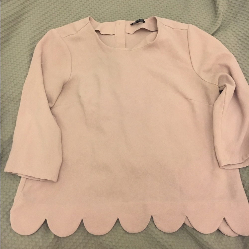 Trendy scalloped blouse