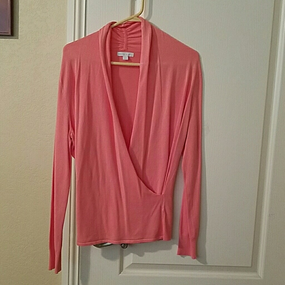 Sweater- coral or salmon color.