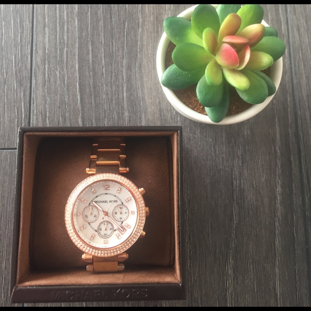 Used rose gold Michael Kors watch OBO