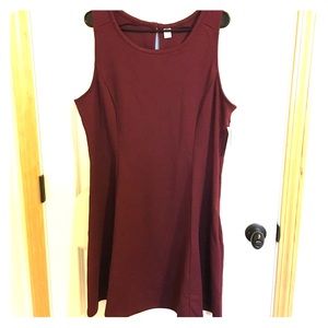 Dress in burgundy with A-line design.