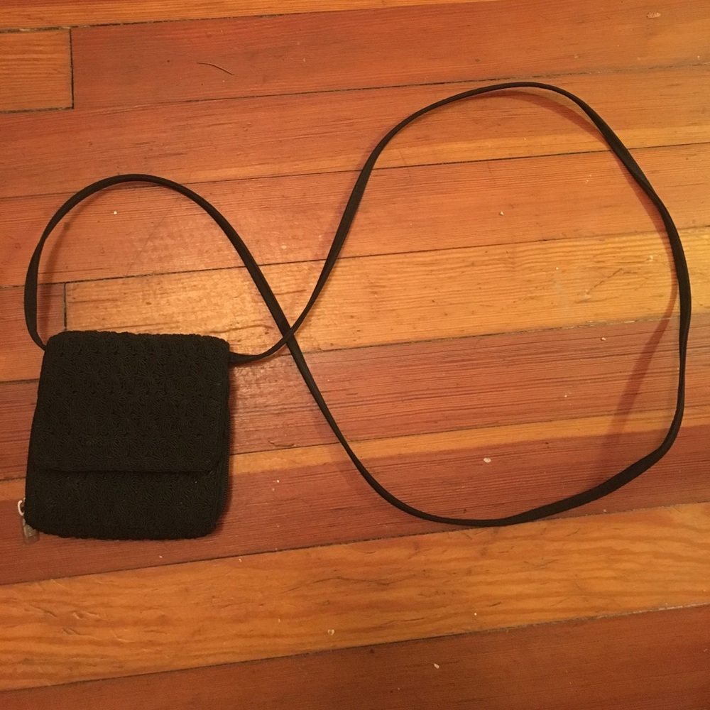 Limited black woven wallet on a string
