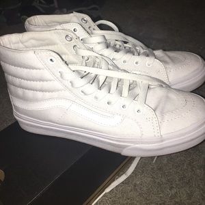 All white Vans skate hi's