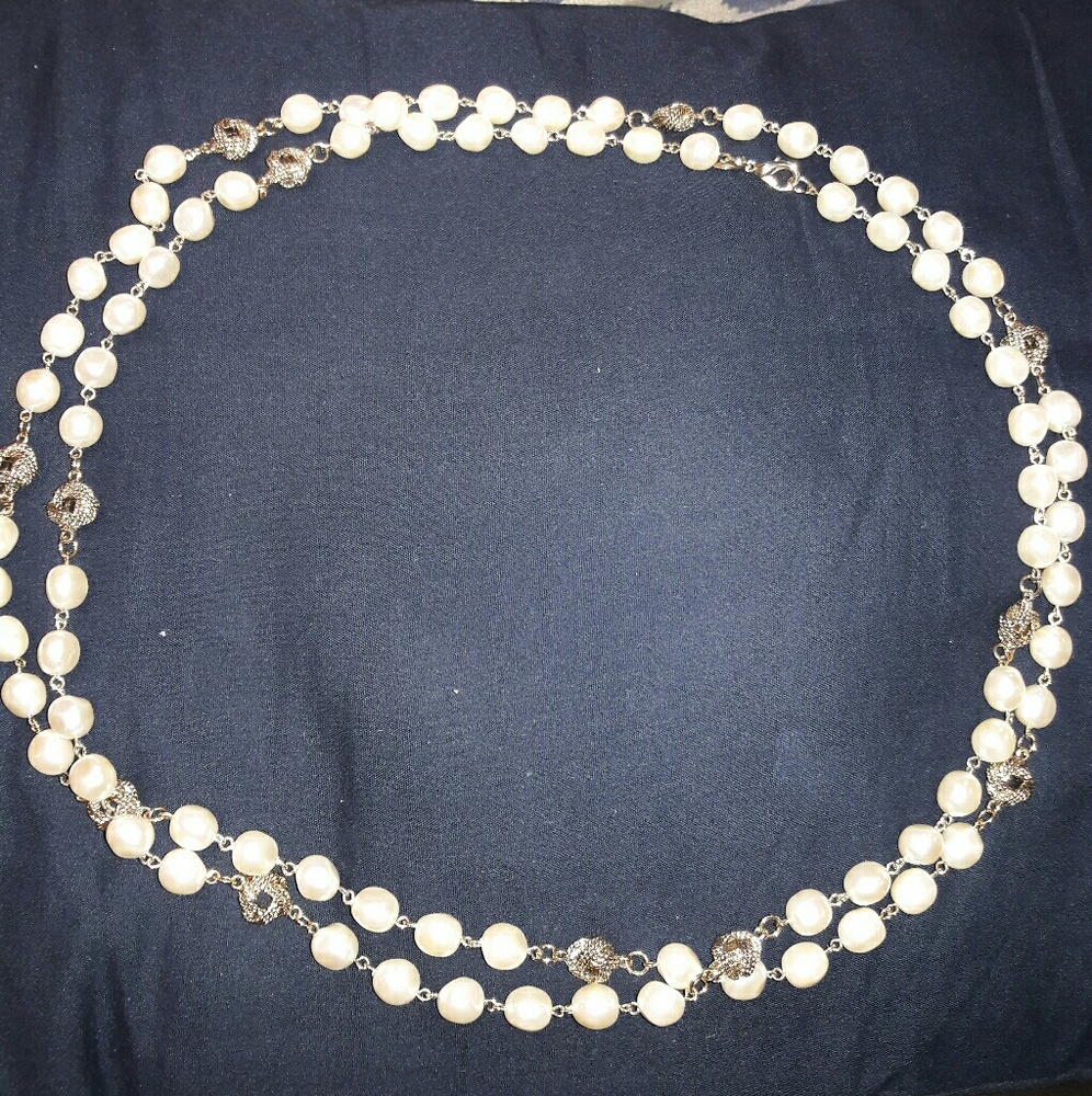 Joan Rivers white pearl neclace.