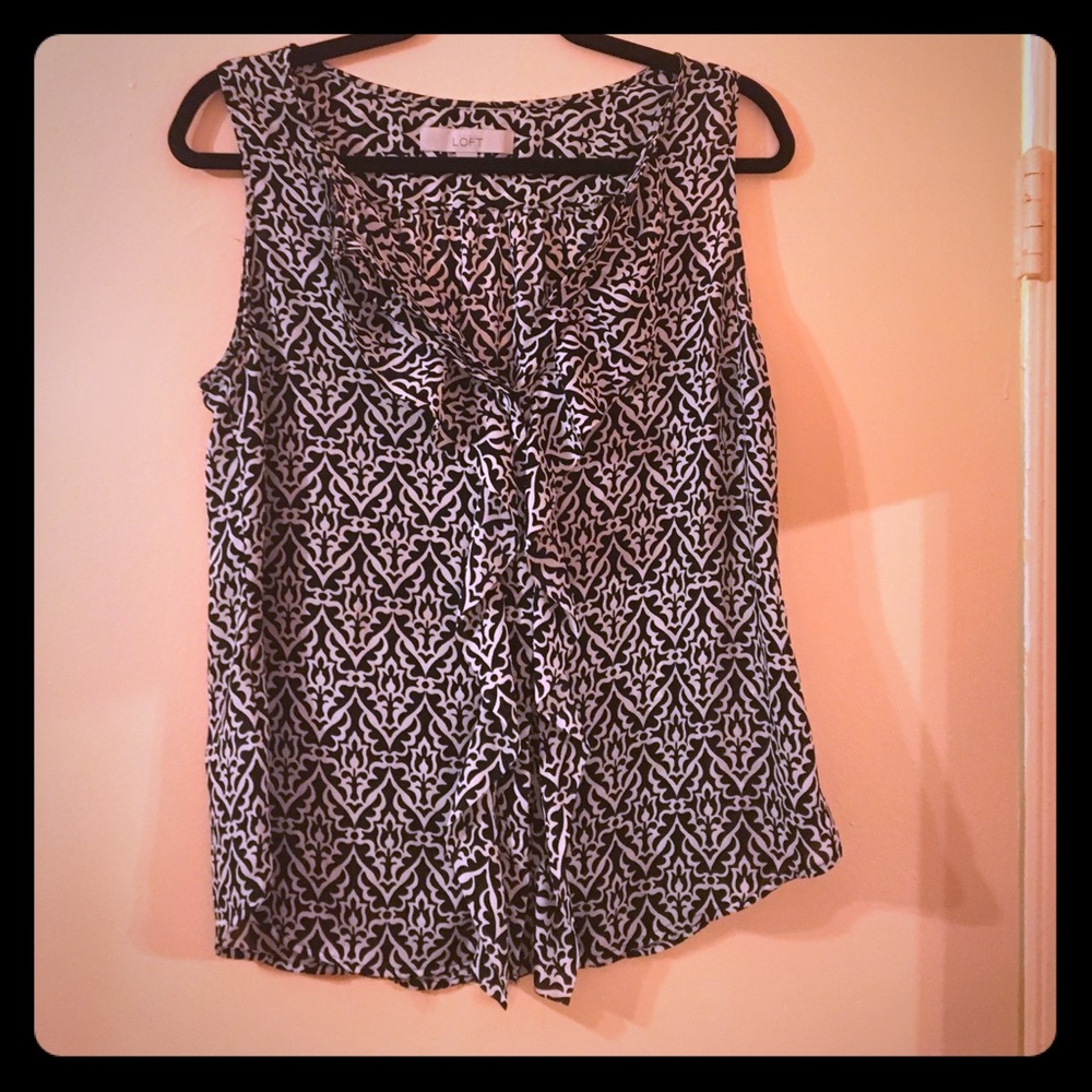 Black and white ruffled blouse