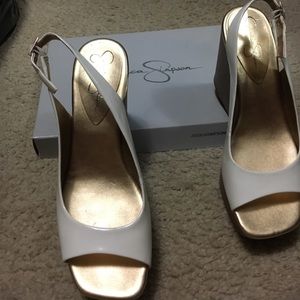 White patent leather Jessica Simpson wedges