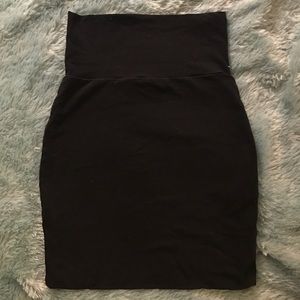 Delia's tight black skirt