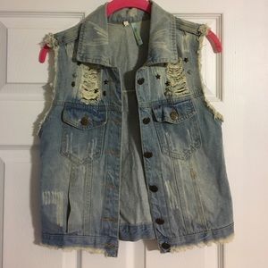 Distressed denim vest with vintage studs