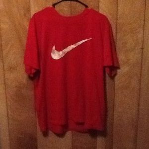 Red Nike dri-fit shirt.