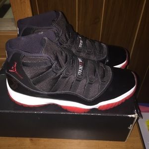 Jordan Retro 11 bred high top 
Size 9.5