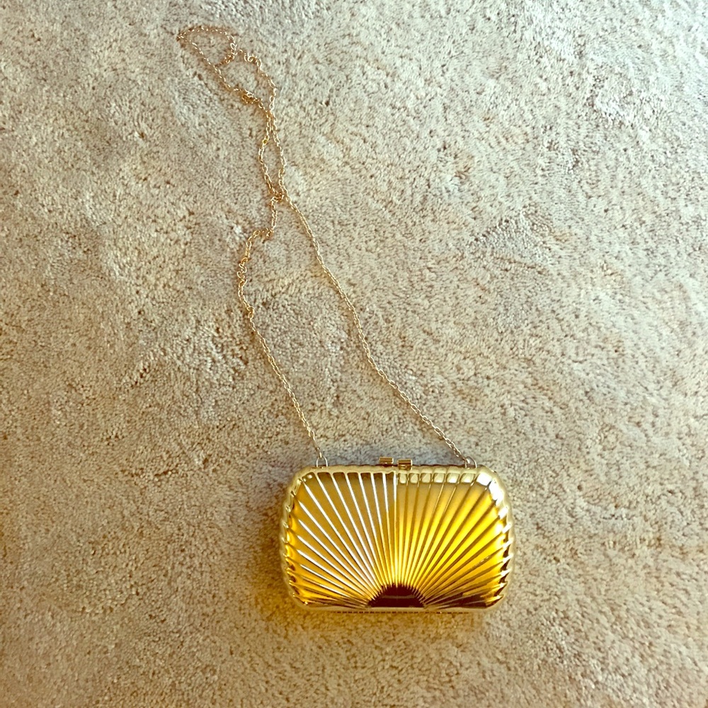 Gold seashell clutch