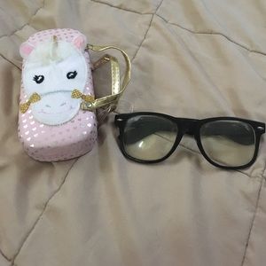 A set of fake clear glasses with the glasses case