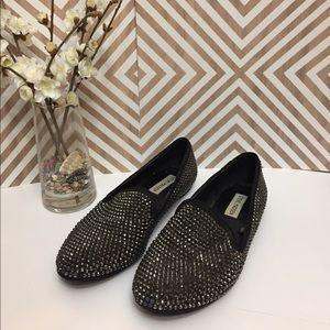 Steve Madden studded flats.