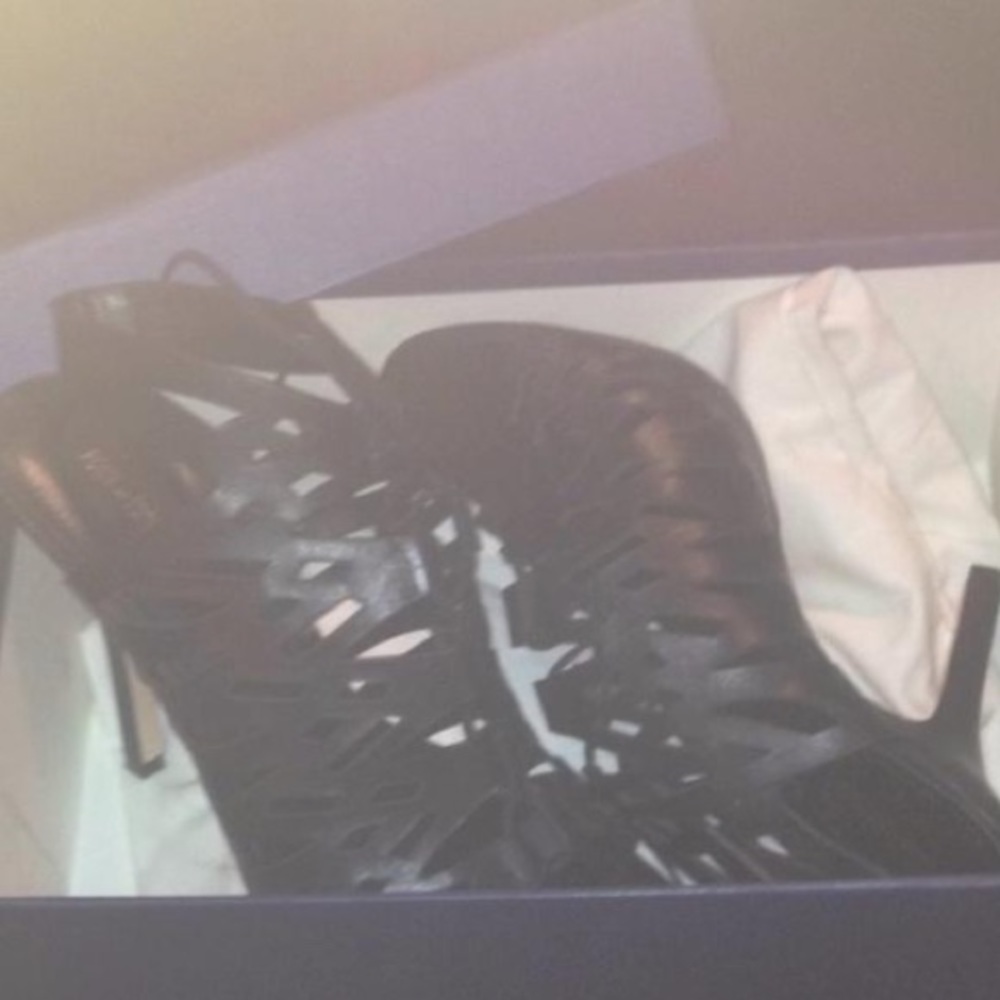 Black strap up shoes