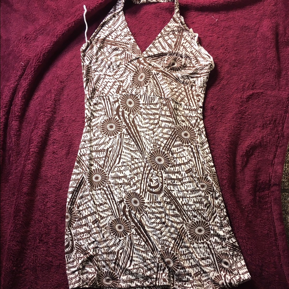 A large white and brown halter dress