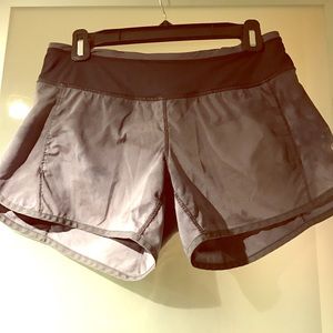 Lululemon black and gray running shorts. Size 4