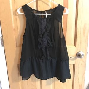 Free People Peplum top with satin detailing.