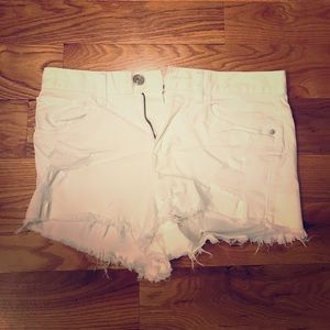 High wasted, distressed shorts.