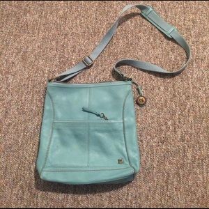 The SAK mint green/ blue-green crossbody.