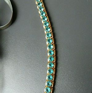 10k yellow gold Blue topaz tennis bracelet