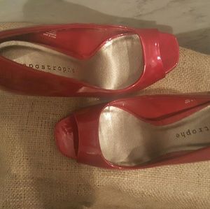 Apostrophe red peep toe pumps