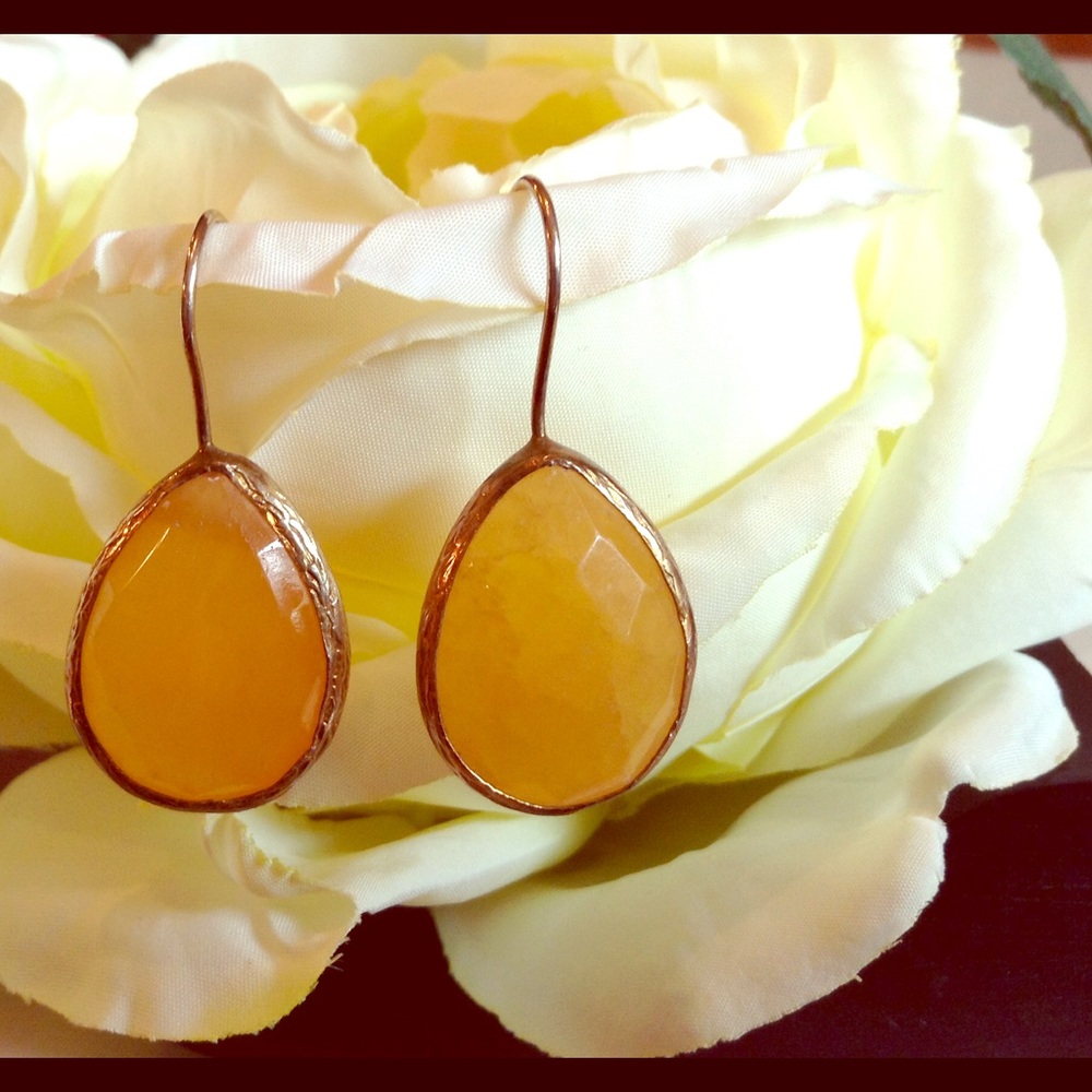 Stealing silver-gold plated earrings