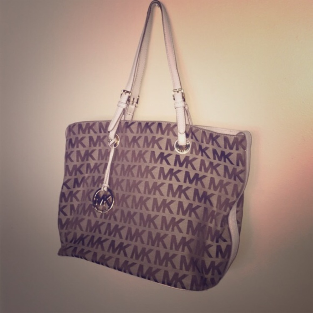 Michael Kors tan over the shoulder hand bag.