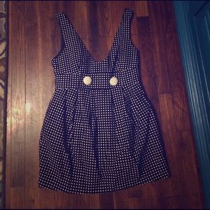 Black polka dot dress.