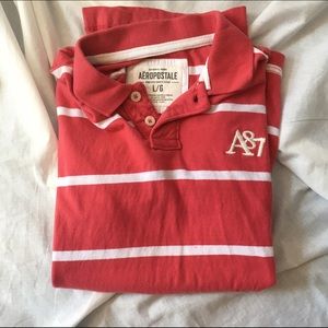 Men's Aeropostale deep salmon collared tee.