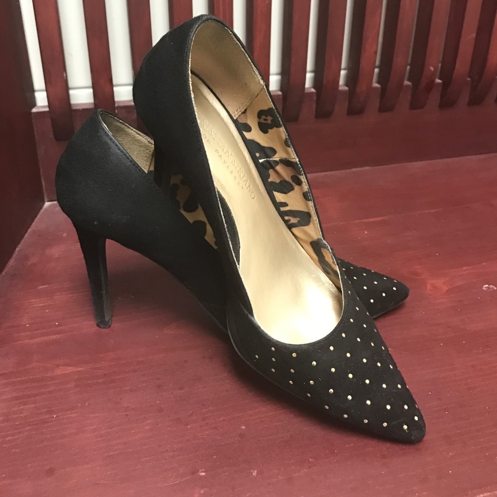 Black pumps with gold studs