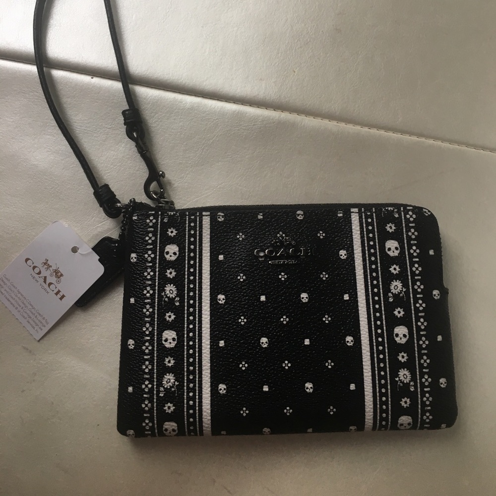 Coach zip wristlet- Skill Bandana print Leather