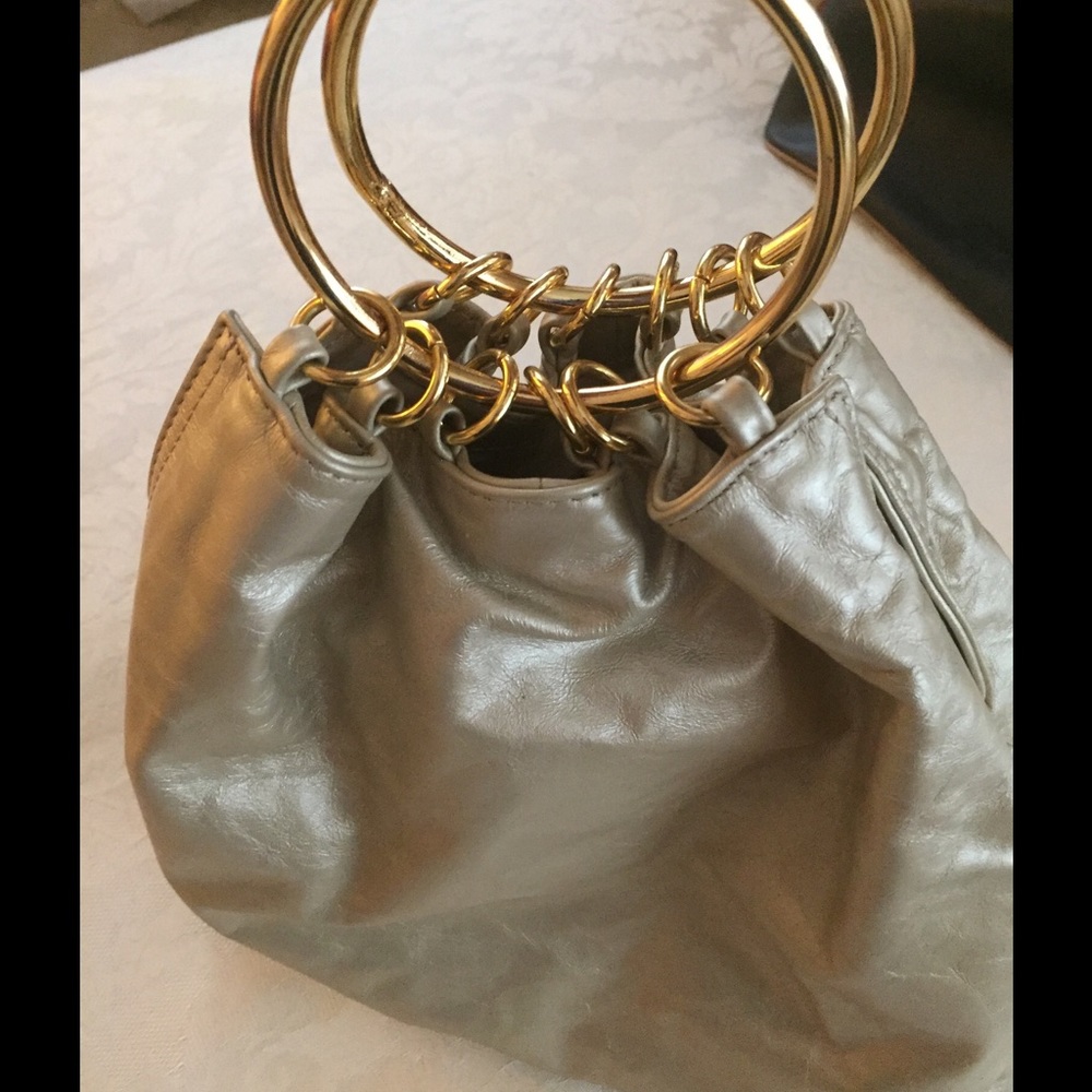 Gold leather hand bag.