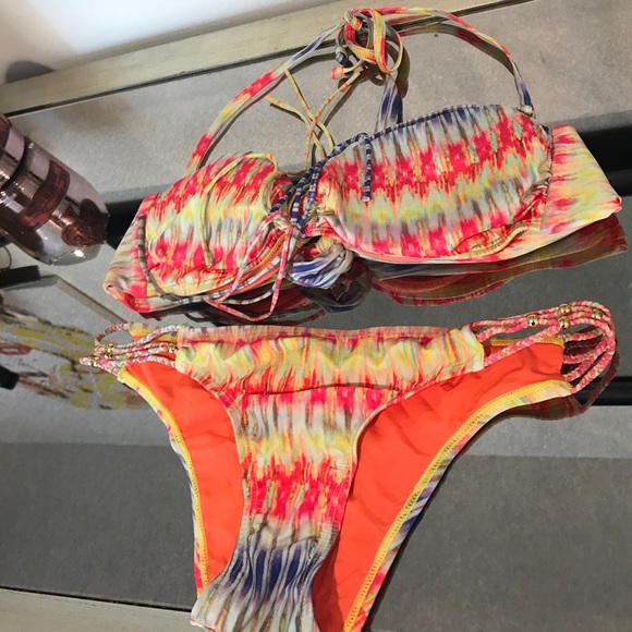 Pilyq Swim - Pily q swim suit small bottom medium top. Pilyq Swim - Pily q swim suit small bottom medium top.