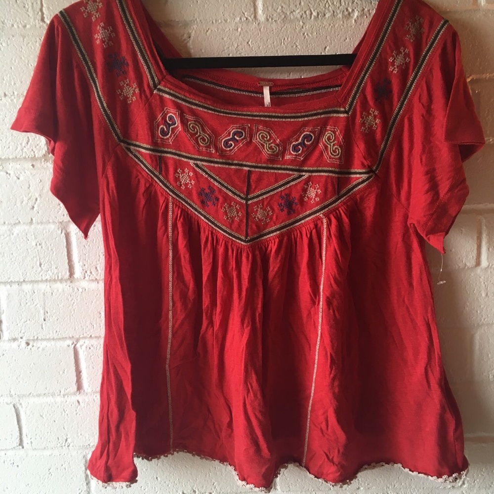 Free people embroidered top.