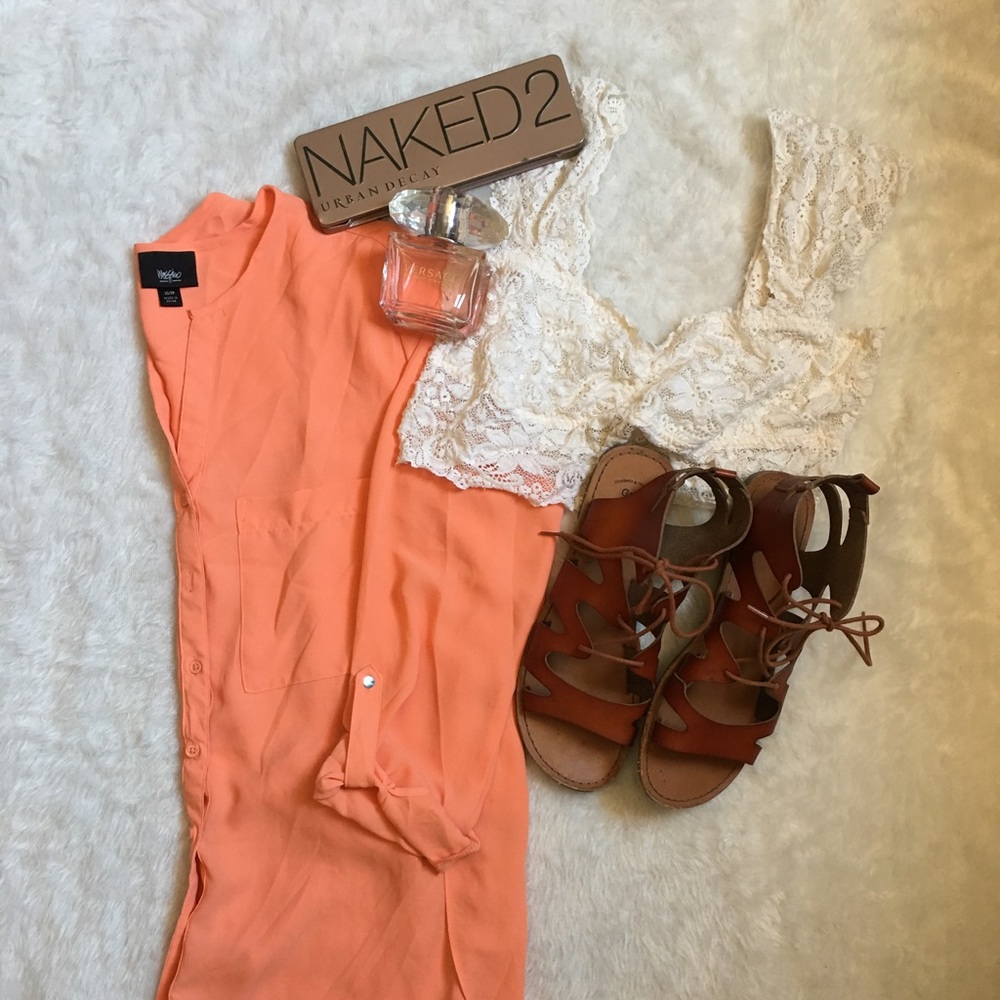 Orange blouse with side cutouts