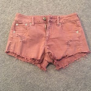 High waisted vintage pink jean shorts.