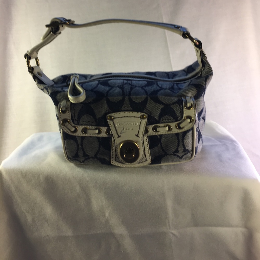 Coach denim and white small handbag.