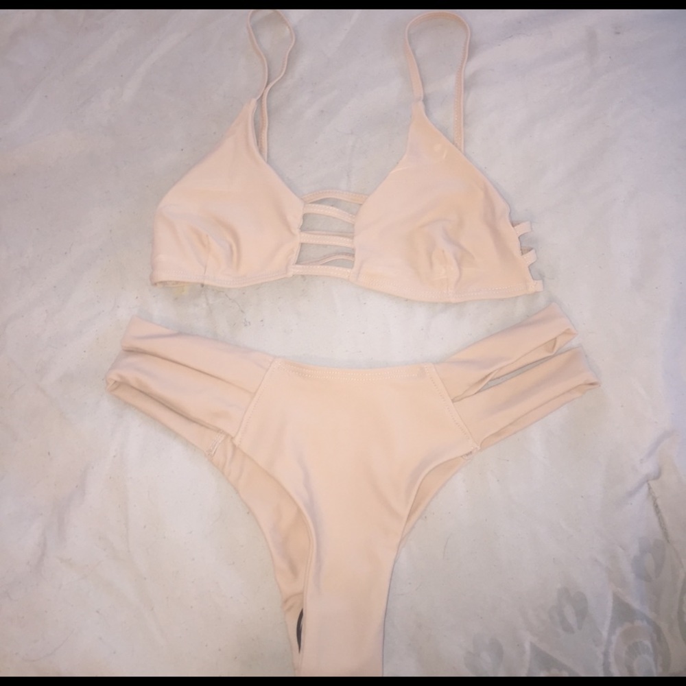 Nude color bikini Brazilian cut.