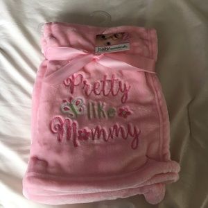 Pink blanket. "Pretty like mommy"