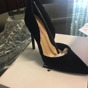 New! Never worn, still in the box stilettos.