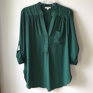 Green v-neck blouse