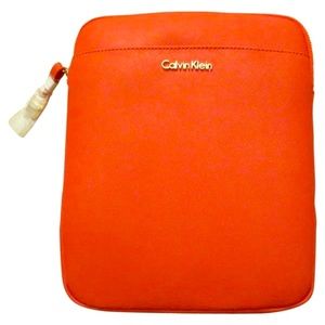 Orange Calvin Klein clutch. Large enough for iPad