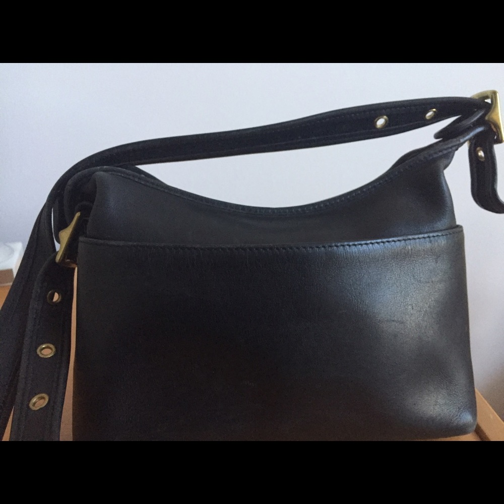 Coach black leather cross body purse